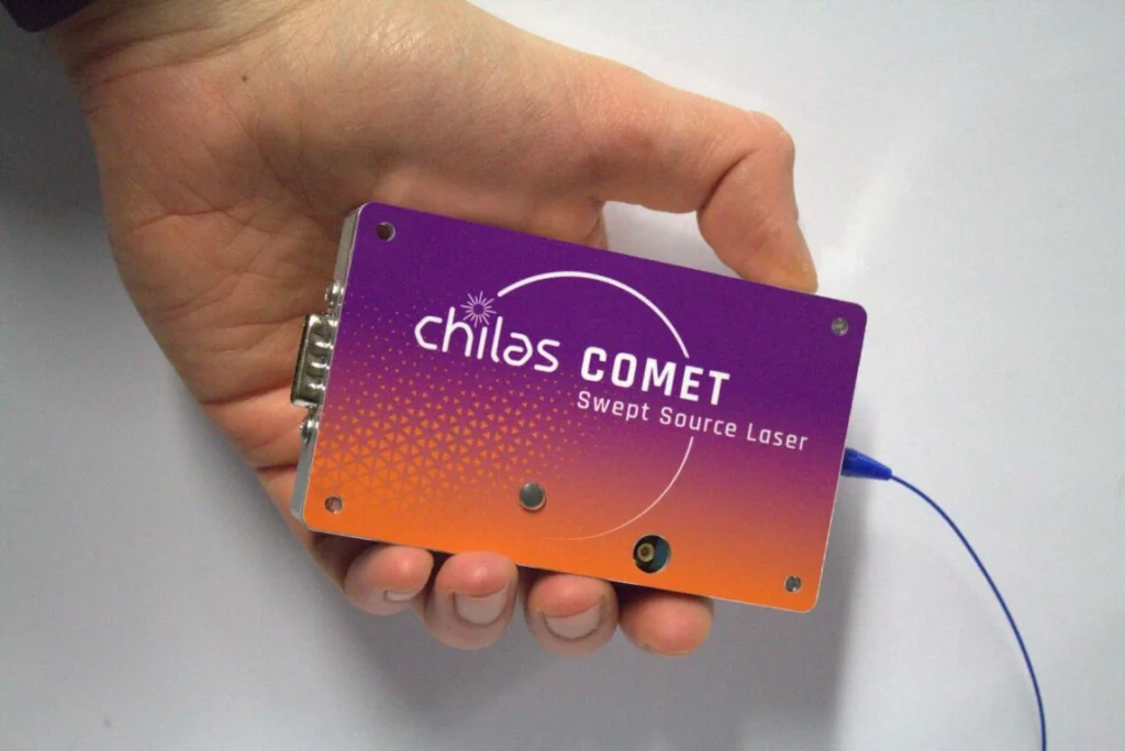Chilas COMET, a Swept Source Laser held in hand