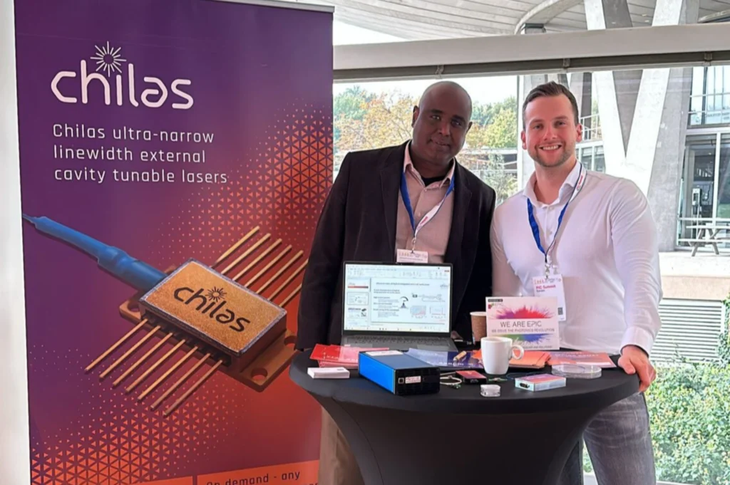 Chilas team members at a trade show, showcasing our tunable lasers 